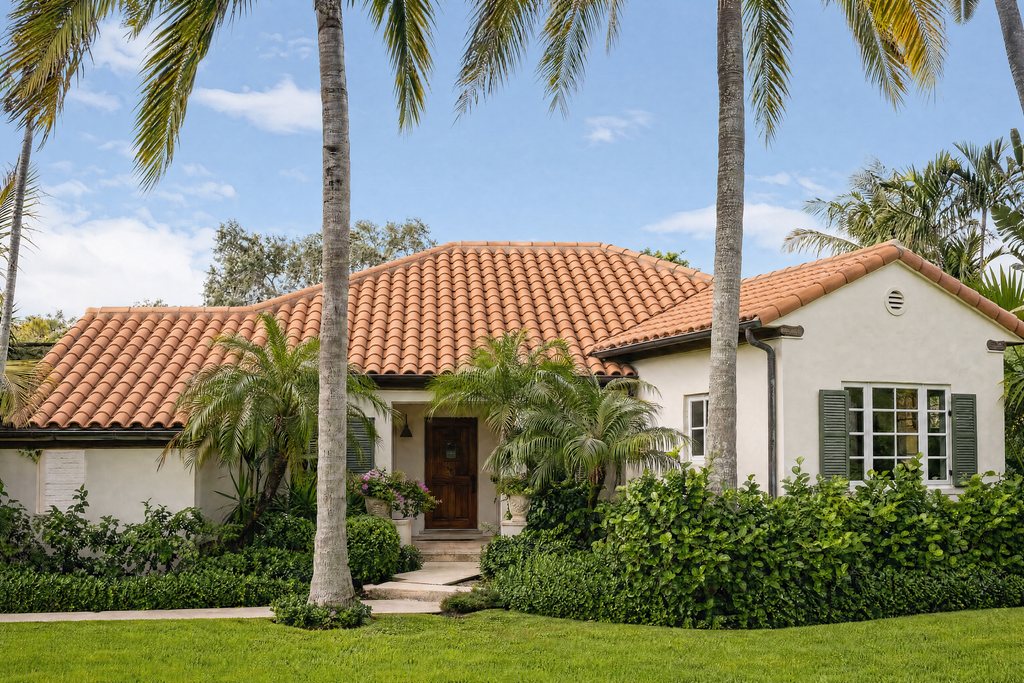 Mediterranean South Florida home with a new terracotta clay barrel tile roof and palm trees (illustrative rendering)