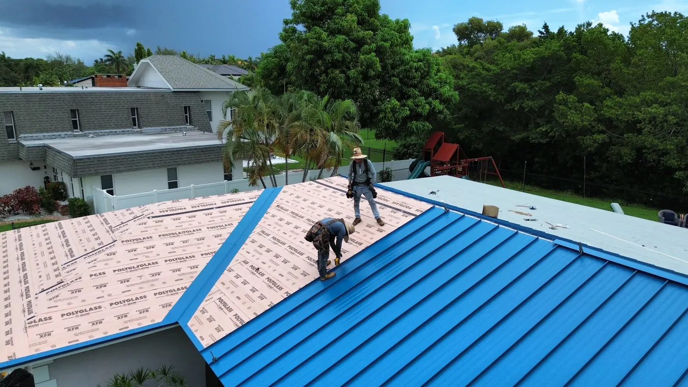 Standing seam meeting the low-slope section